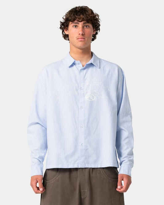 Image of a model wearing Tops. Product name - Rusty Mens Freaker Long Sleeve Shirt Sky Blue in Sky Blue colour by brand - Rusty