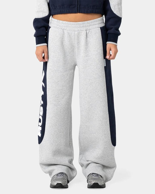 Image of a model wearing Pants. Product name - Rusty Womens Harvest Balloon Track Pants Grey Marle in Grey Marle colour by brand - Rusty