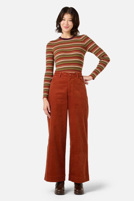Image of a model wearing Pants. Productname: Jamie Cord Wide Leg Jean in Rust colour by brand - Princess Highway