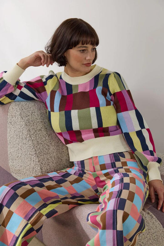 Image of a model wearing Outerwear. Product name - Arty Check Knit Jumper in Print colour by brand - Gorman