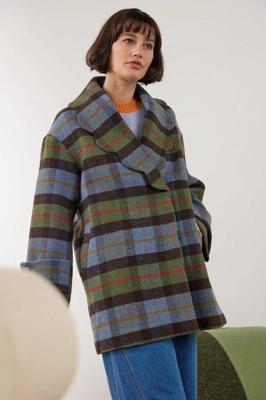 Image of a model wearing Outerwear. Product name - Farm To Table Check Coat in Blue colour by brand - Gorman