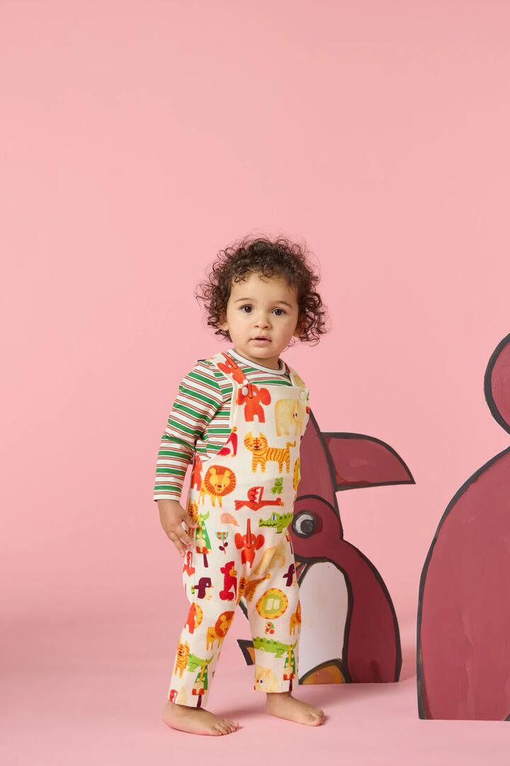 Image of a model wearing Pants. Product name - Animals Baby Overalls in Cream colour by brand - Gorman