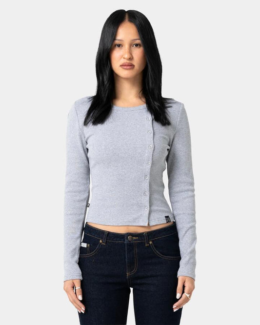 Image of a model wearing Tops. Product name - Rusty Womens Button Up Long Sleeve Top Grey Marle in Grey Marle colour by brand - Rusty