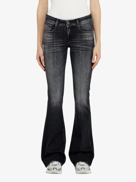 Image of a model wearing Pants. Productname: Diesel 1969 D-Ebbey L.32 Trousers in Black colour by brand - Diesel