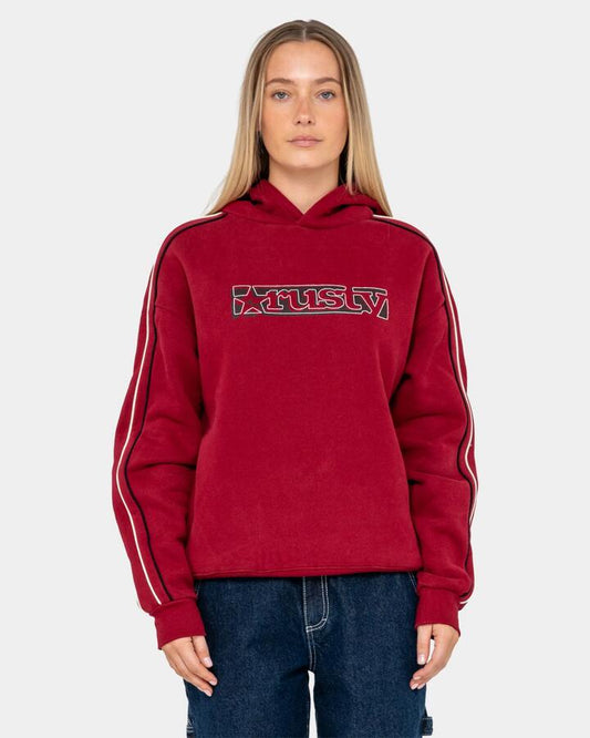 Image of a model wearing Outerwear. Product name - Rusty Womens Red Raw Archival Oversized Pullover Hoodie Red in Red colour by brand - Rusty