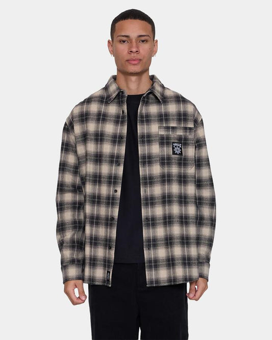 Image of a model wearing Tops. Product name - Thrills Mens Stagger Barrio Long Sleeve Flannel Shirt Black in Black colour by brand - Thrills