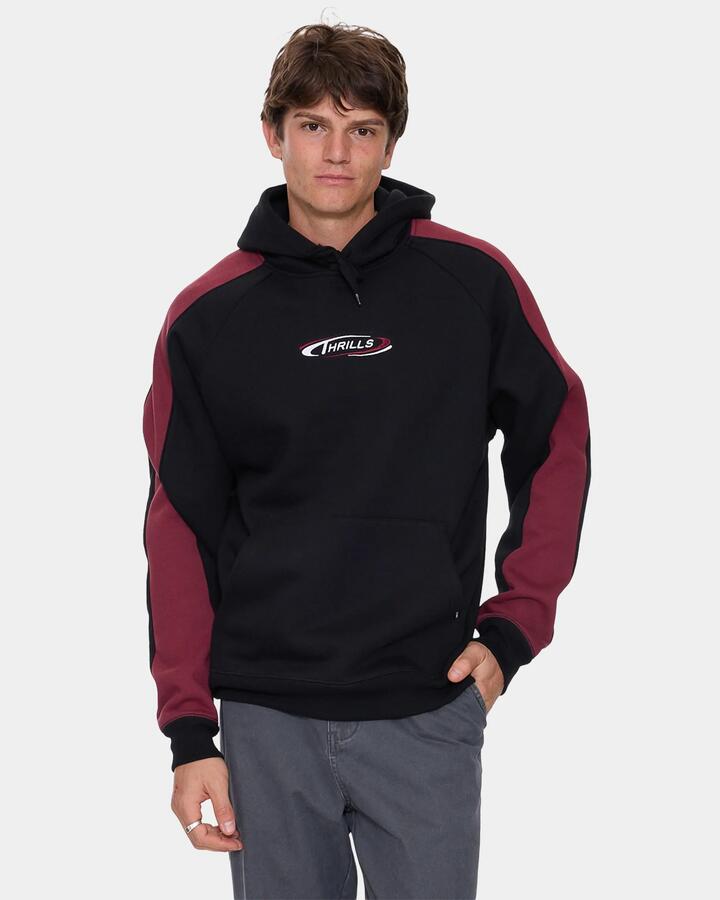 Image of a model wearing Outerwear. Product name - Thrills Mens Spectral Raglan Panel Cropped Pullover Hoodie Black in Black colour by brand - Thrills