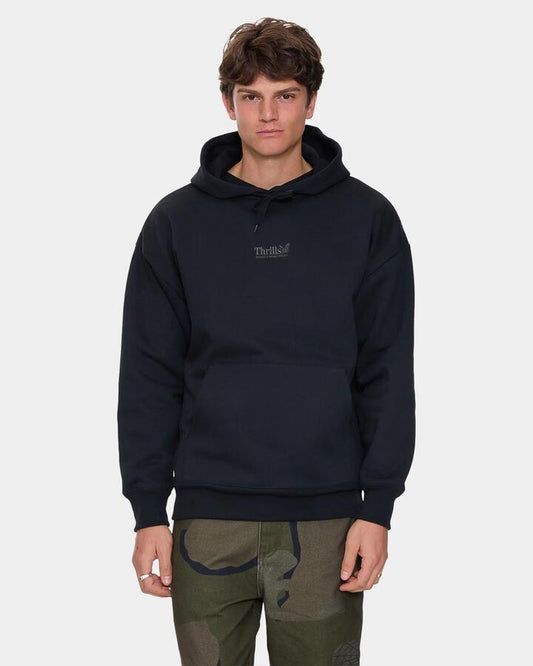 Image of a model wearing Outerwear. Product name - Thrills Mens Thrills Union Slouch Pullover Hoodie Pirate Black in Pirate Black colour by brand - Thrills
