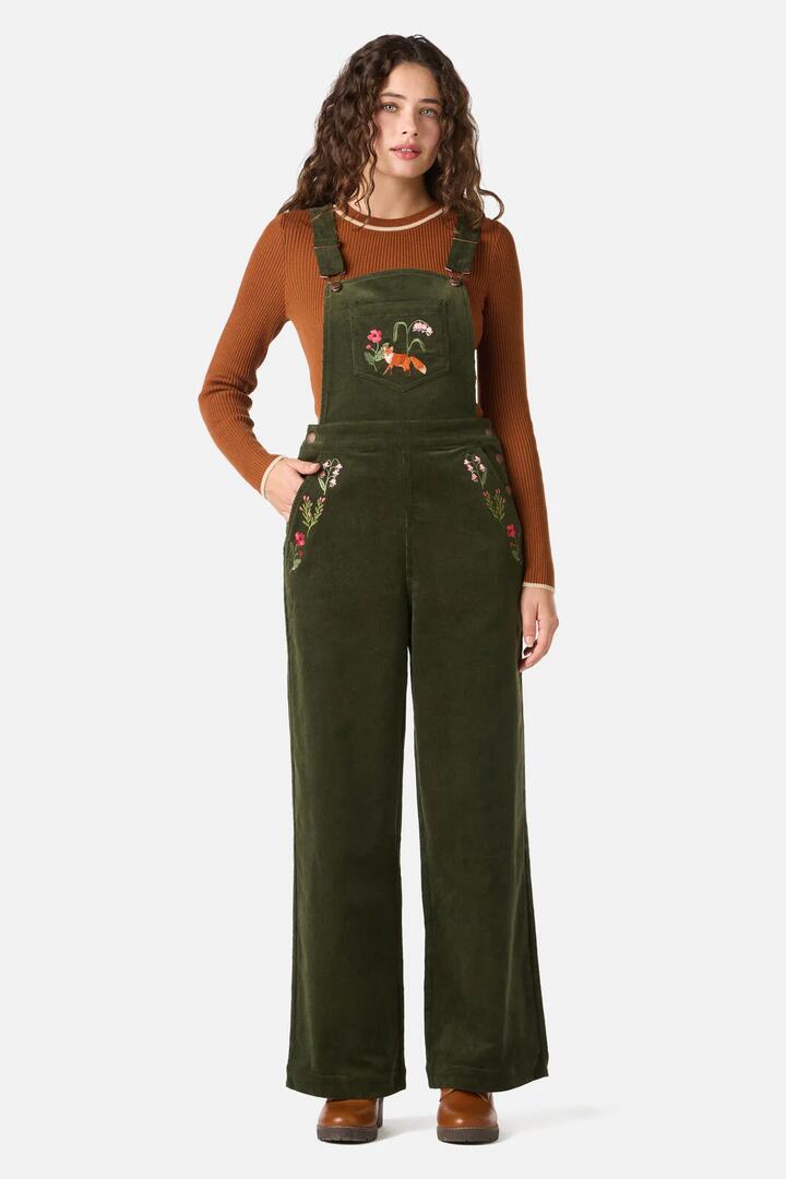 Image of a model wearing Pants. Productname: Fox Embroidered Cord Overall in Olive colour by brand - Princess Highway