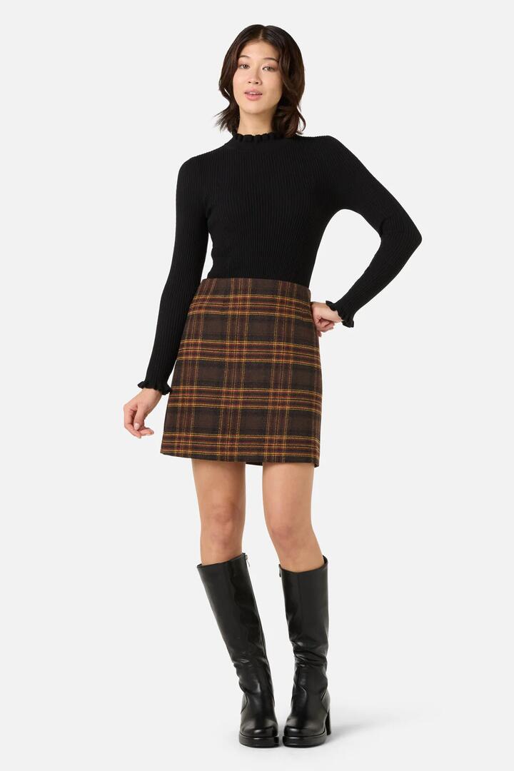 Image of a model wearing Skirts. Productname: Wilma Check Mini Skirt in Chocolate colour by brand - Princess Highway