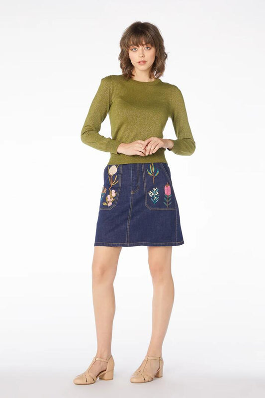 Image of a model wearing Skirts. Productname: Bella Natice Emb Skirt in Dark Denim colour by brand - Princess Highway
