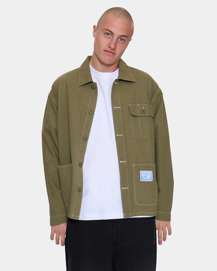 Image of a model wearing Outerwear. Product name - Worship Mens Genesis Chore Overshirt Jacket Cali Green in Cali Green colour by brand - Worship