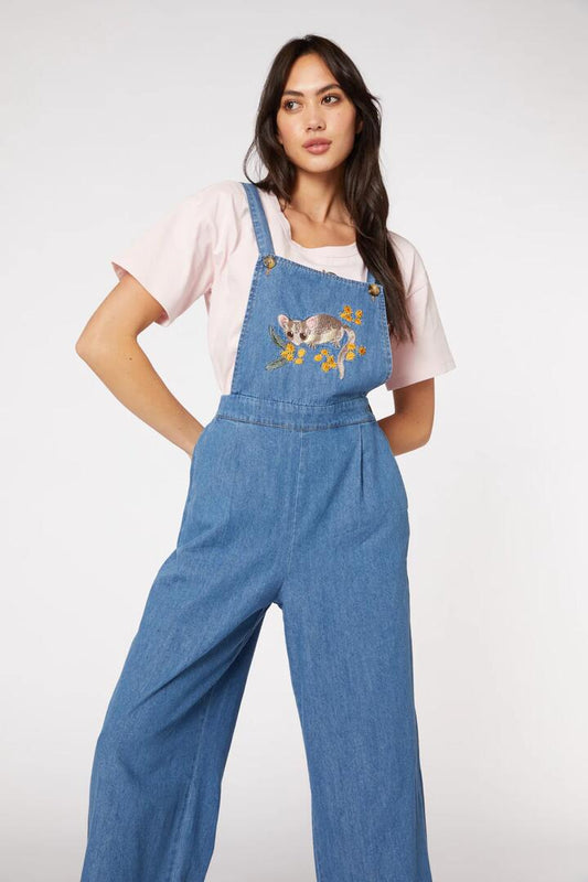 Image of a model wearing Pants. Productname: Fairy Possum Overall in Mid Blue colour by brand - Princess Highway