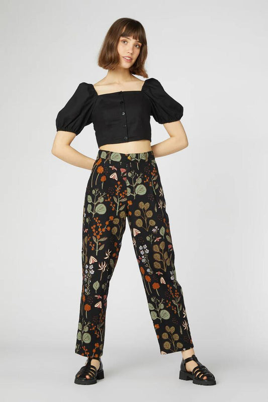 Image of a model wearing Pants. Productname: Botanical Native Pant in Black colour by brand - Princess Highway