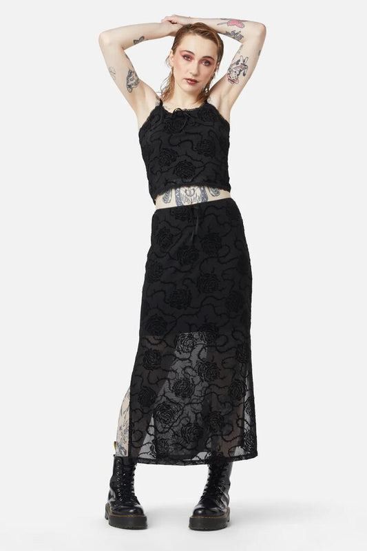Image of a model wearing Skirts. Productname: Decaying Days Flocked Mesh Skirt in Black colour by brand - Dangerfield