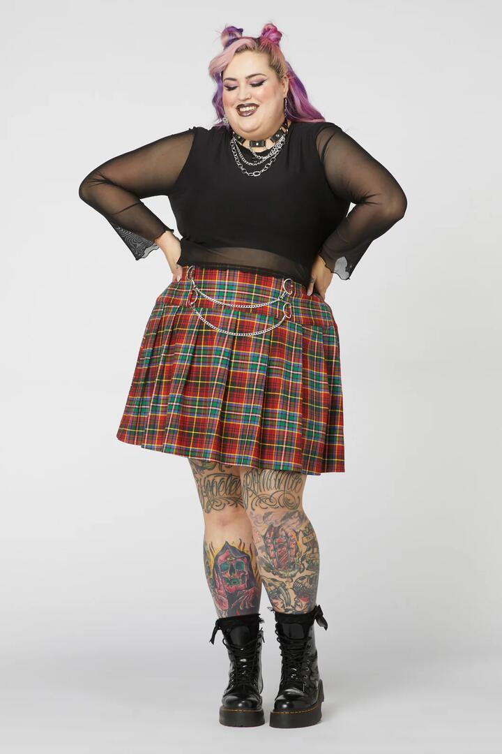 Image of a model wearing Skirts. Productname: Curve Wichita Tartan Mini Skirt in Red colour by brand - Dangerfield