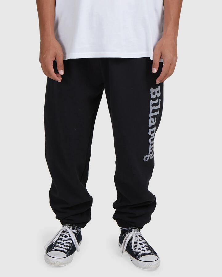 Image of a model wearing Pants. Product name - Billabong Mens Team Elastic Beach Pants Black in Black colour by brand - Billabong