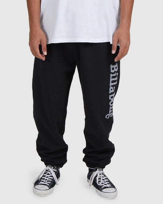 Image of a model wearing Pants. Product name - Billabong Mens Team Elastic Beach Pants Black in Black colour by brand - Billabong