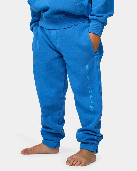 Image of a model wearing Pants. Product name - Rip Curl Boys 2-7 Surf Check Track Pants Royal Blue in Royal Blue colour by brand - Rip Curl
