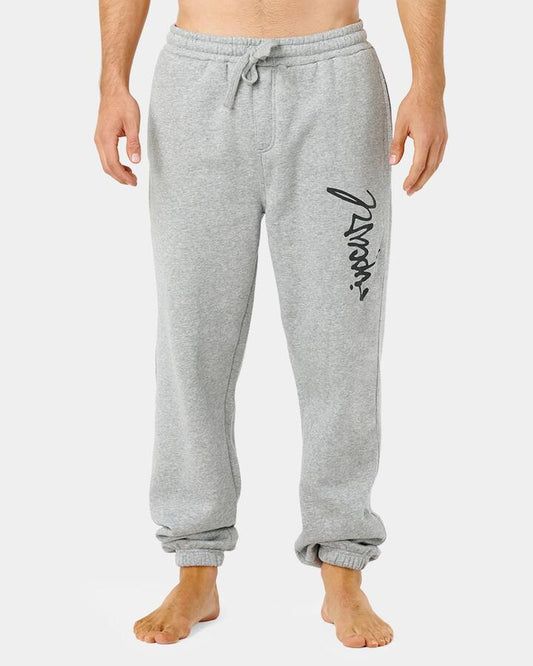 Image of a model wearing Pants. Product name - Rip Curl Mens Icons Of Surf Trackpants Grey Marle/Black in Grey Marle/Black colour by brand - Rip Curl
