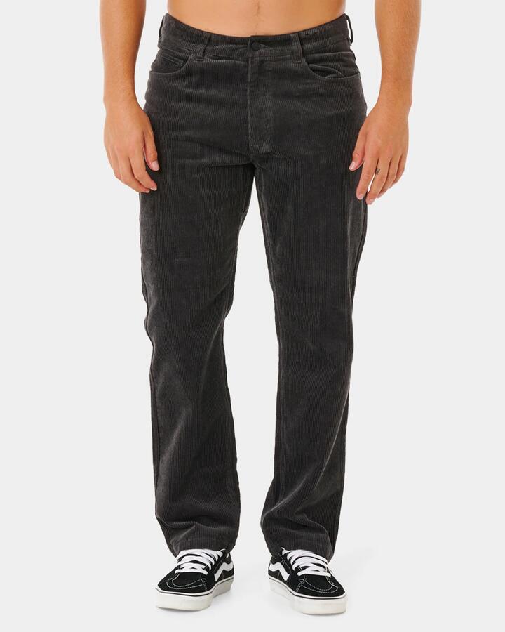 Image of a model wearing Pants. Product name - Rip Curl Mens Premium Surf Cord Pants Black in Black colour by brand - Rip Curl
