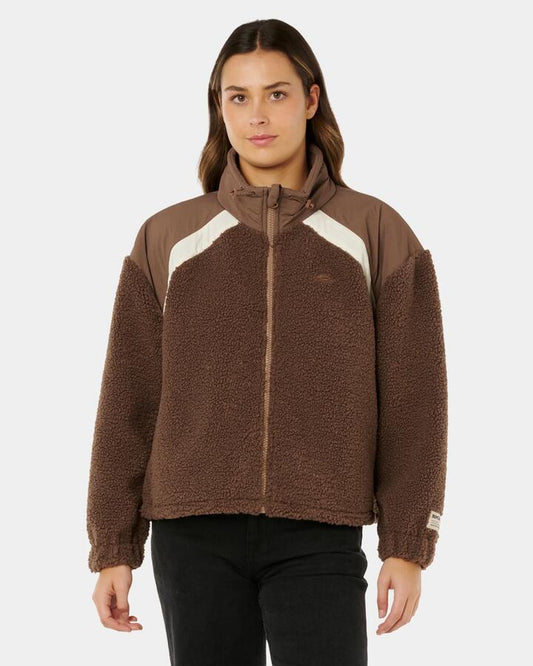 Image of a model wearing Outerwear. Product name - Rip Curl Womens Anti-Series Polar Fleece Jacket Brown in Brown colour by brand - Rip Curl