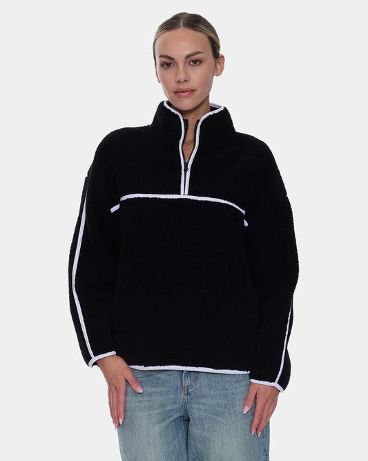 Image of a model wearing Outerwear. Product name - Thrills Womens All Star Sherpa Fleece Jumper Black in Black colour by brand - Thrills