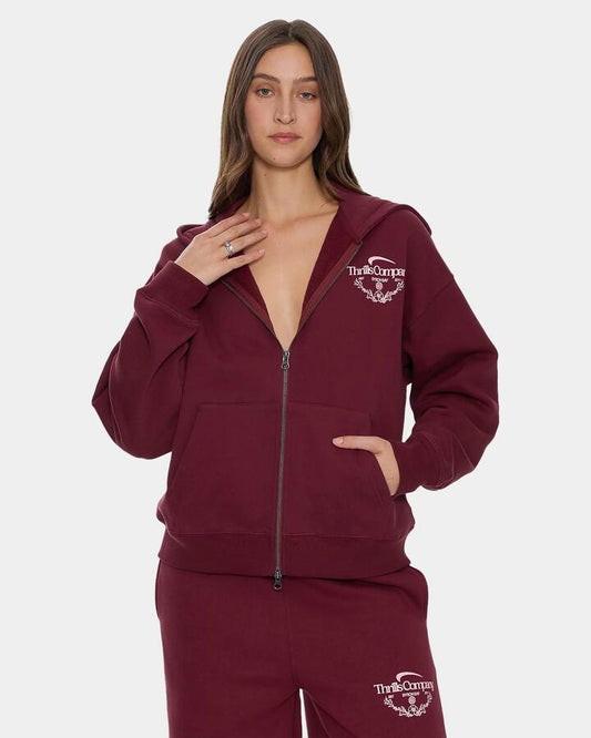 Image of a model wearing Outerwear. Product name - Thrills Womens End Game Zip Up Hoodie New Maroon in New Maroon colour by brand - Thrills