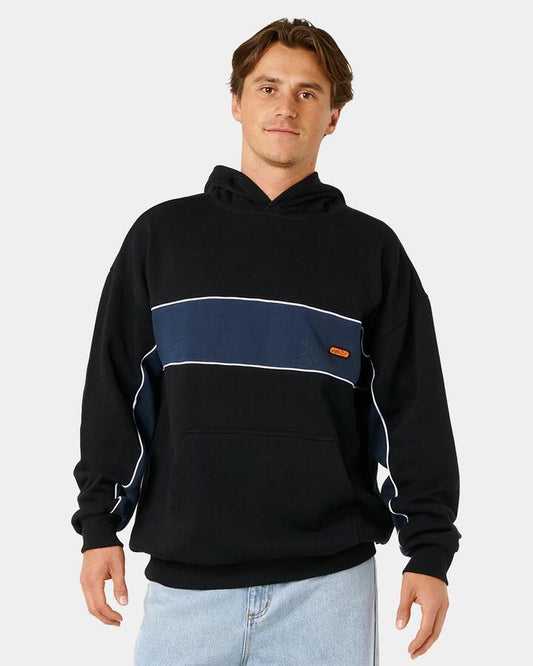 Image of a model wearing Outerwear. Product name - Rip Curl Mens Panel Beater Pullover Hoodie Black in Black colour by brand - Rip Curl