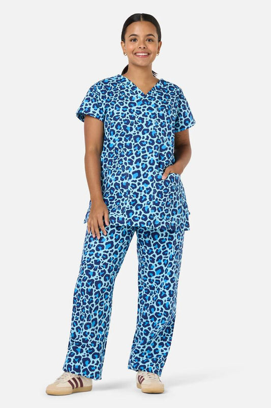 Image of a model wearing Uniforms & Workwear. Productname: Leopard Cub Scrub Set in Blue colour by brand - Scrubs With Love