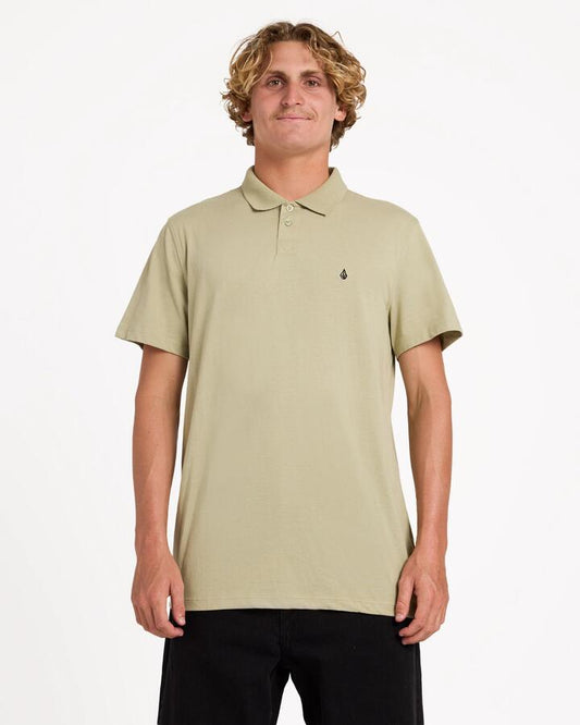 Image of a model wearing Shorts. Product name - Volcom Mens Middler Polo Short Sleeve Shirt Green Tea in Green Tea colour by brand - Volcom