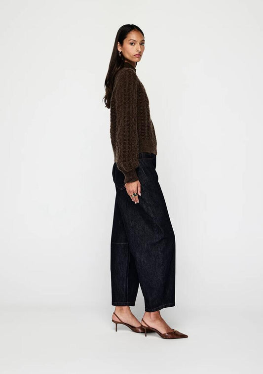 Image of a model wearing Outerwear. Productname: Mave Jumper | MOS The Label in Chocolate colour by brand - MOS The Label