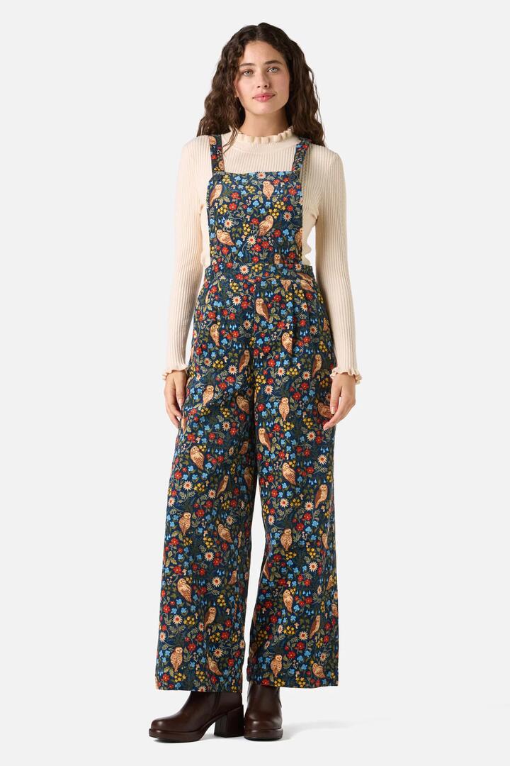 Image of a model wearing Pants. Productname: Forest Owl Cord Overall in Teal colour by brand - Princess Highway