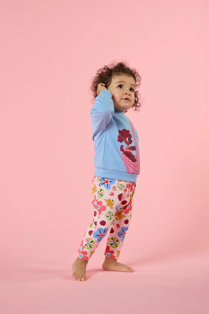 Image of a model wearing Pants. Product name - Spotty Floral Baby Legging in Pink colour by brand - Gorman