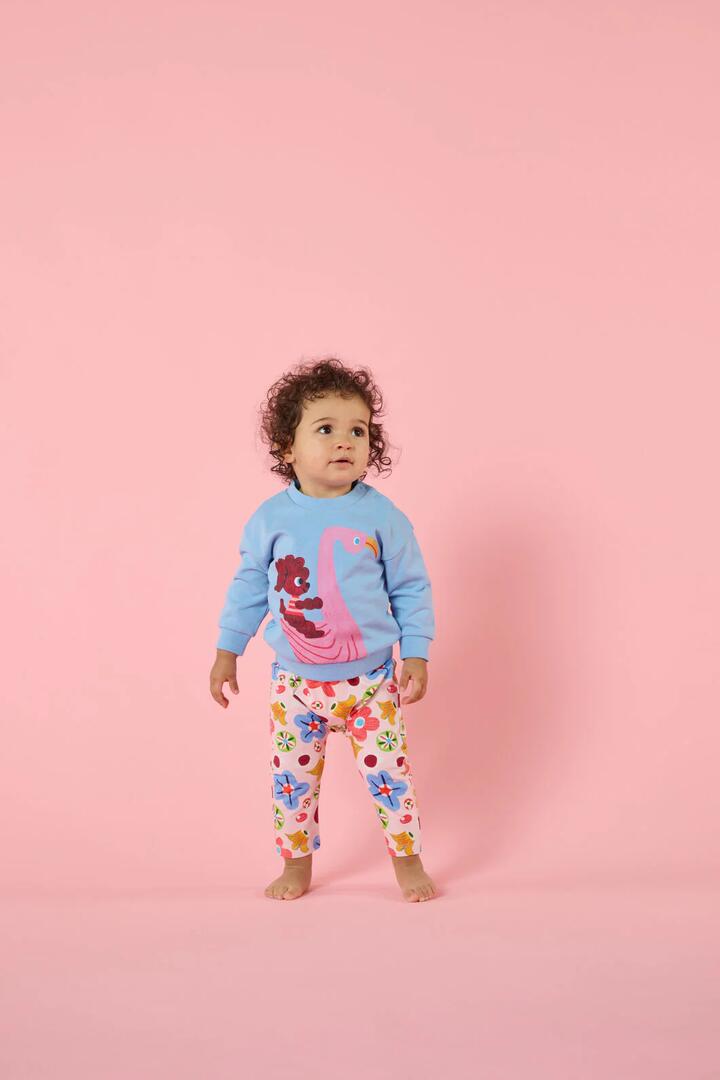 Image of a model wearing Outerwear. Product name - Flamingo Baby Sweater in Blue colour by brand - Gorman