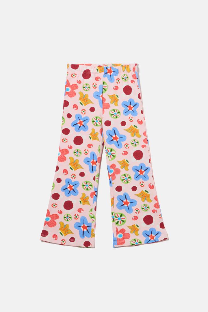 Image of a model wearing Pants. Product name - Spotty Floral Kids Legging in Pink colour by brand - Gorman