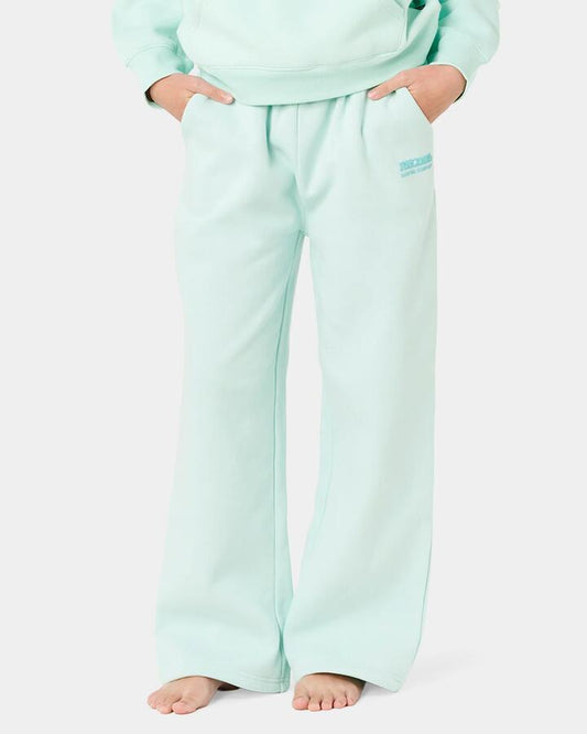 Image of a model wearing Pants. Product name - Rip Curl Girls 8-16 Surf Puff Wide Leg T Pants Light Sea Blue in Light Sea Blue colour by brand - Rip Curl