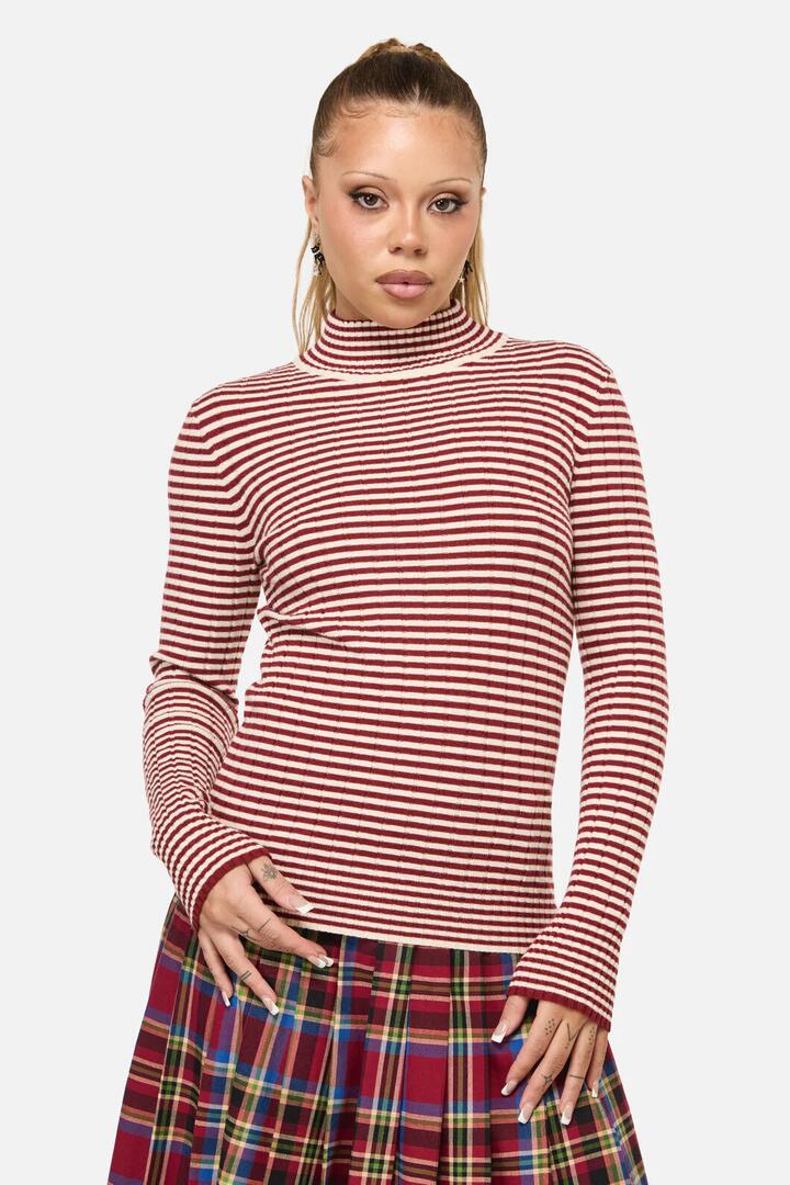 Image of a model wearing Tops. Productname: Mii Stripe Knit in Red/Cream colour by brand - Dangerfield
