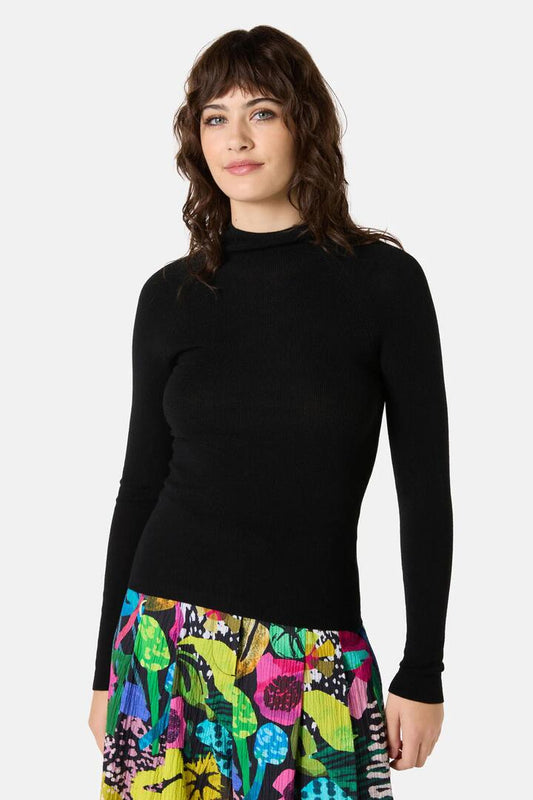 Image of a model wearing Tops. Product name - Anika Knit Top in Black colour by brand - Gorman