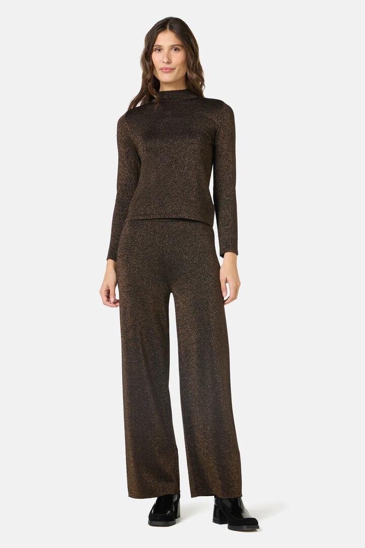 Image of a model wearing Pants. Product name - Astryix Knit Pant in Black colour by brand - Gorman