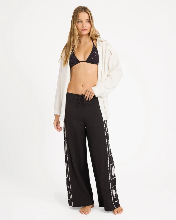 Image of a model wearing Pants. Product name - Billabong Womens Sea Side Dreamer Elastic Waist Pants Black Sands in Black Sands colour by brand - Billabong