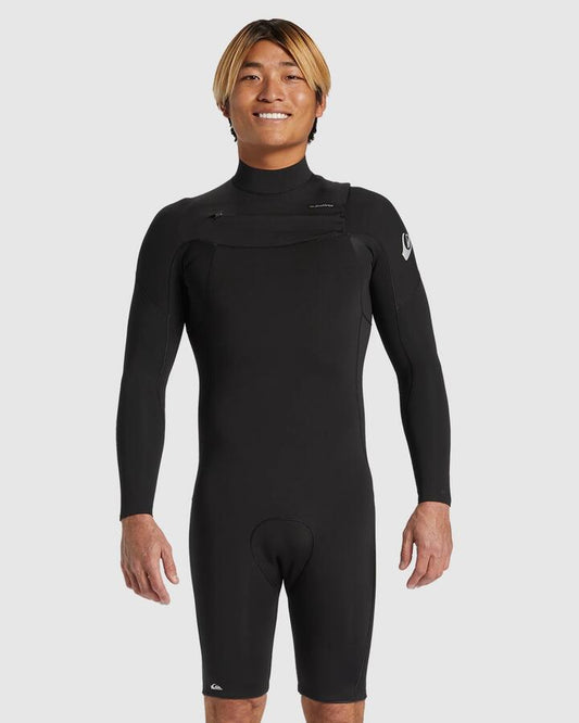 Image of a model wearing Tops. Product name - Quiksilver Mens 2/2Mm Everyday Sessions Chest Zip Long Sleeve Springsuit Black in Black colour by brand - Quiksilver