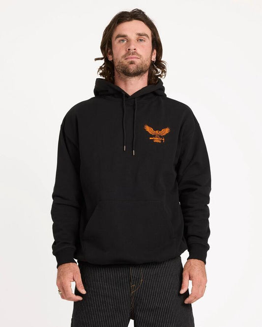 Image of a model wearing Outerwear. Product name - Volcom Mens Hammered Pullover Hoodie Black in Black colour by brand - Volcom