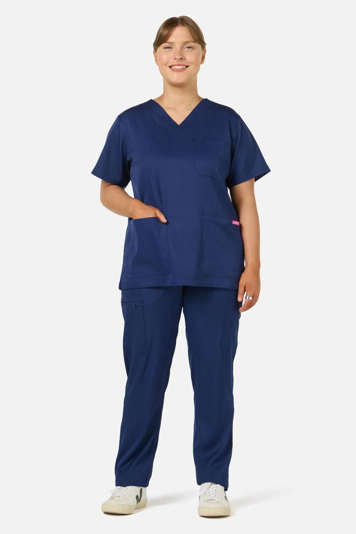 Image of a model wearing Uniforms & Workwear. Productname: Scrubs With Love Navy Scrub set in Navy colour by brand - Scrubs With Love