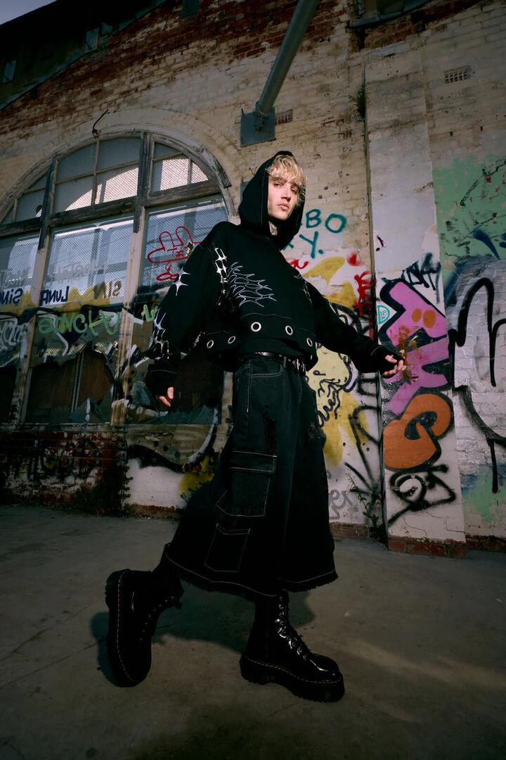 Image of a model wearing Pants. Productname: Y2K Sigil Wide Leg Jeans in Black colour by brand - Dangerfield