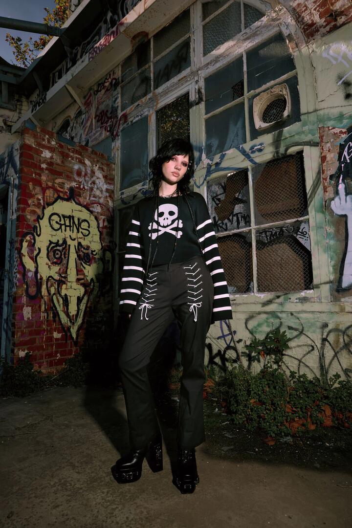 Image of a model wearing Pants. Productname: Link Lacing Flare Pant in Black colour by brand - Black Friday