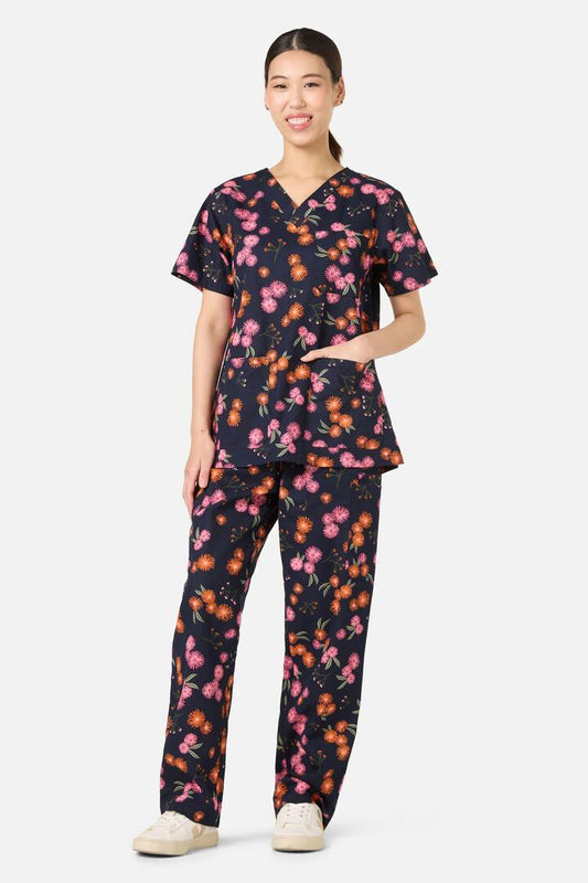 Image of a model wearing Uniforms & Workwear. Productname: Gumnut Puffs Scrub Set in Navy colour by brand - Scrubs With Love