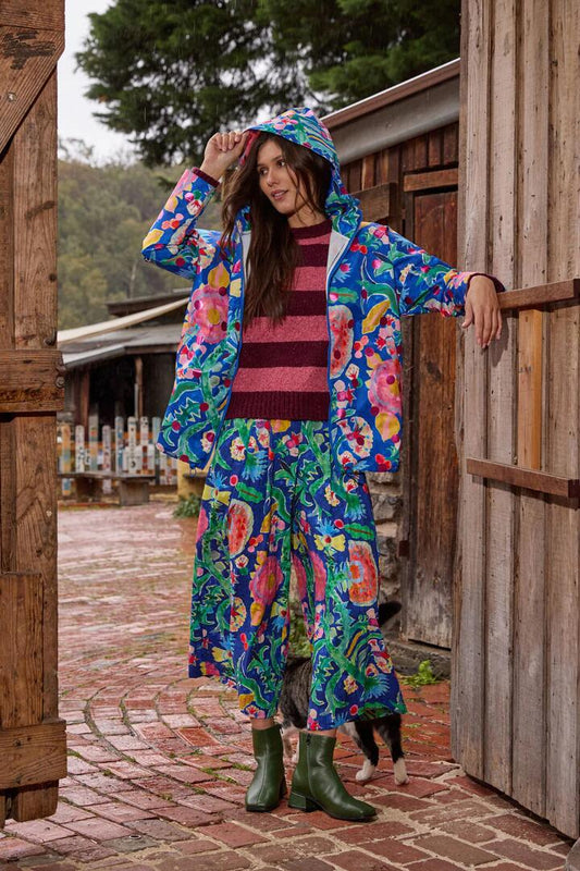 Image of a model wearing Rain Coats. Product name - Secret Meadow Print Raincoat in Print colour by brand - Gorman