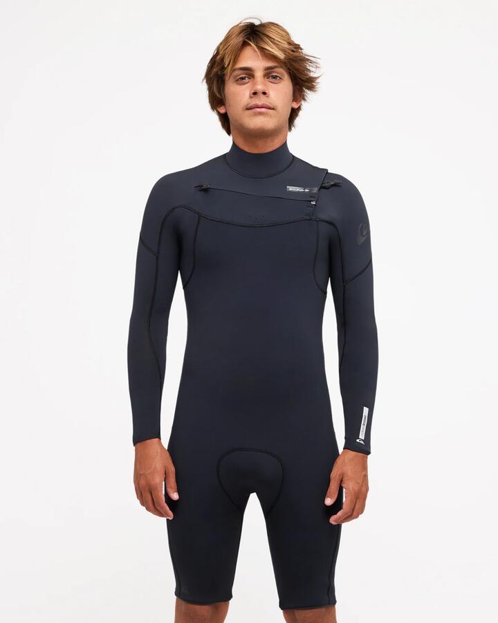 Image of a model wearing Tops. Product name - Quiksilver Mens 2/2Mm Everyday Sessions Chest Zip Long Sleeve Springsuit Black in Black colour by brand - Quiksilver