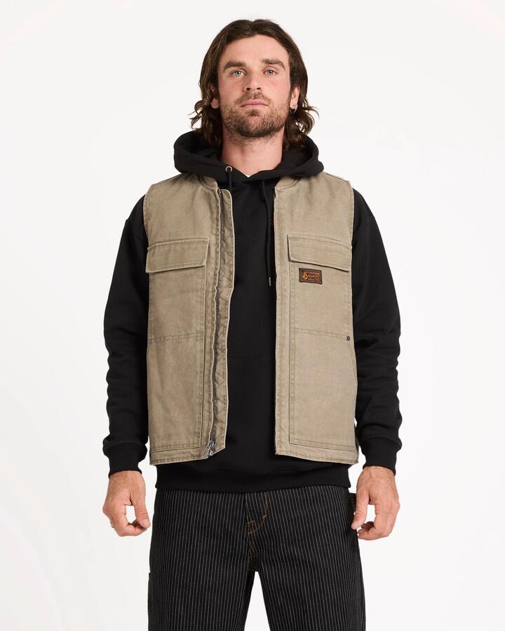 Image of a model wearing Uniforms & Workwear. Product name - Volcom Mens Freshdust Workwear Vest Brindle in Brindle colour by brand - Volcom